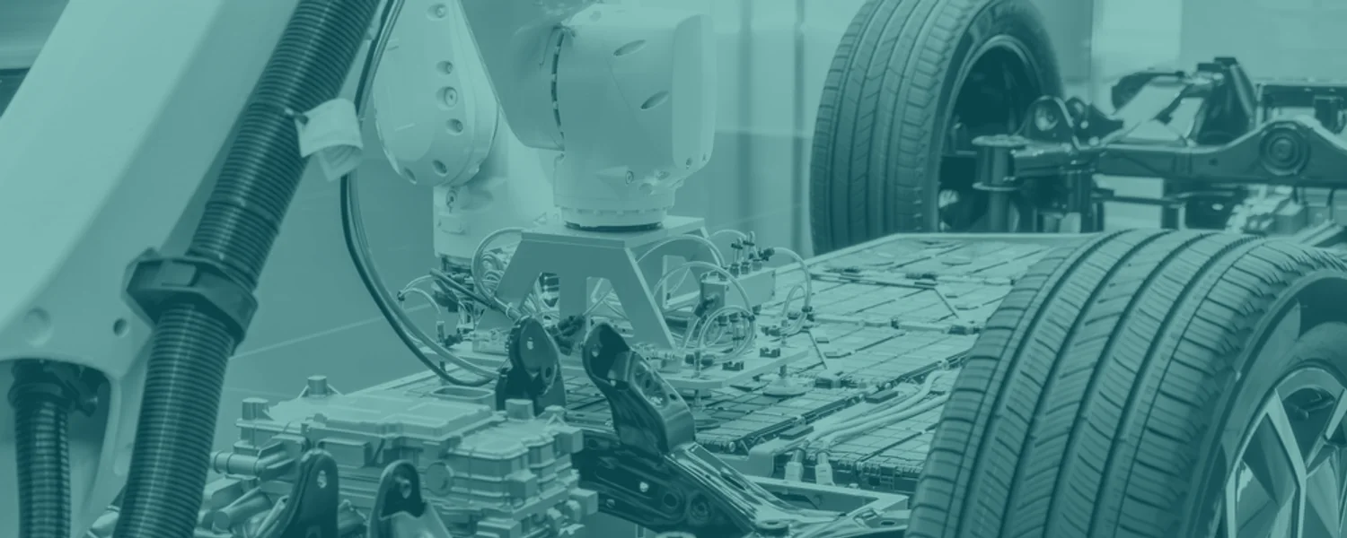 A robotic assembly system working on an electric vehicle platform.